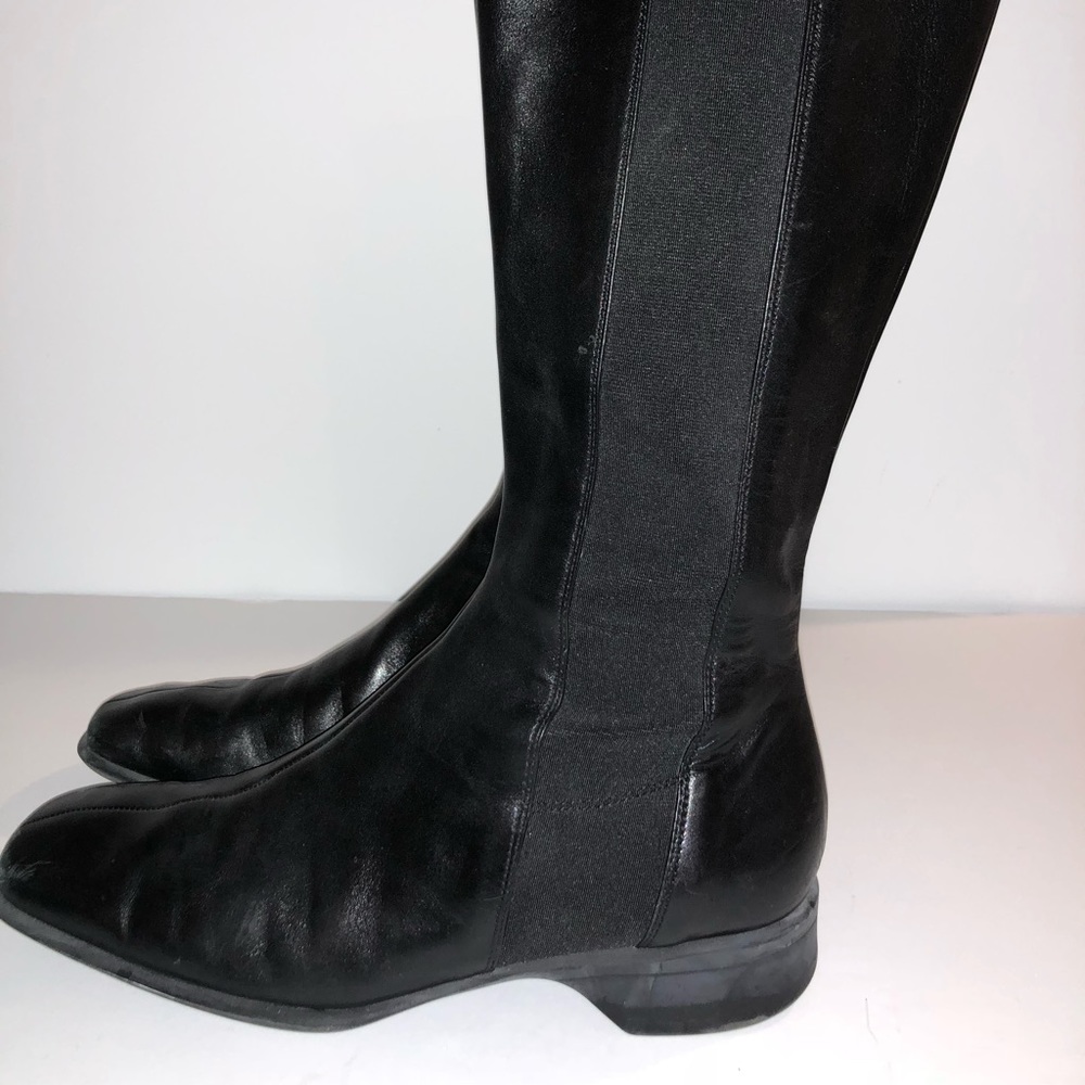 Knee high Prada boots